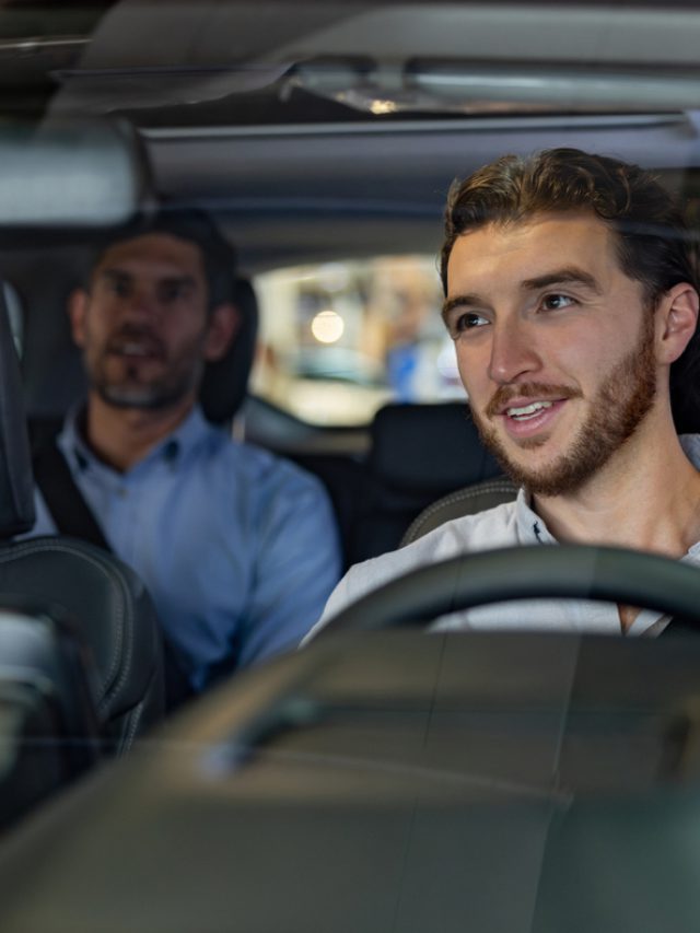 Crowdsourced taxi driver taking to a passenger